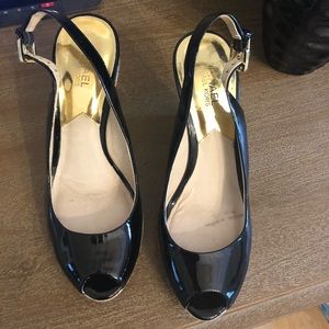 Michael Kors  black patent leather sandals.